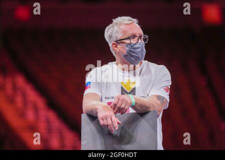 LAS VEGAS, NV - AUGUST 21: Freddie Roach looks on while Manny is answering questions during the post-fight press conference at T-Mobile Arena for Pacquiao vs. Ugas - Main Event on August 21, 2021 in Las Vegas, NV, United States. (Photo by Louis Grasse/PxImages) Credit: Px Images/Alamy Live News Stock Photo