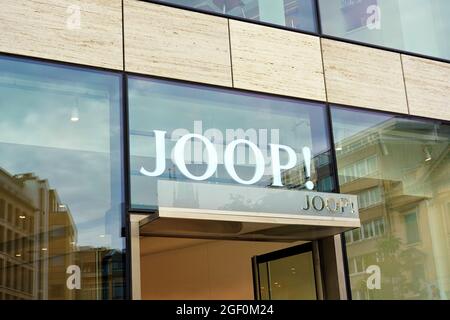 Entrance and logo of a Joop! designer store on Königsallee in Düsseldorf. Königsallee is one of the leading luxury shopping boulevards in Europe. Stock Photo