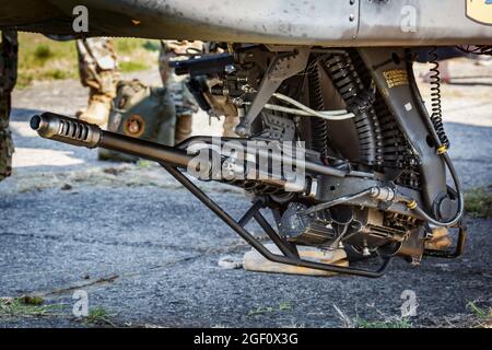 Kaposujlak, Hungary - June 5, 2021: US Army Boeing AH-64 Apache military helicopter 30mm M230 Chain Gun system. Aviation and rotorcraft. Attack force. Stock Photo