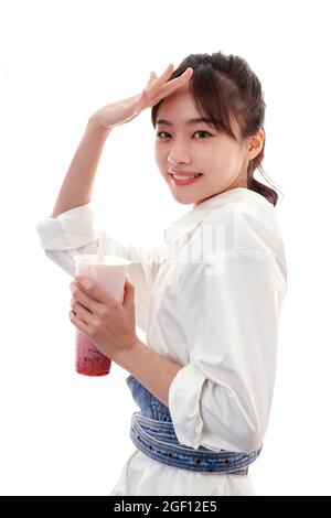 Young girl with a milk tea Stock Photo