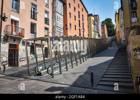 Vitoria-Gasteiz, Spain - 21 August, 2021: Urban escalators as public transport in old town Vitoria Gasteiz Stock Photo
