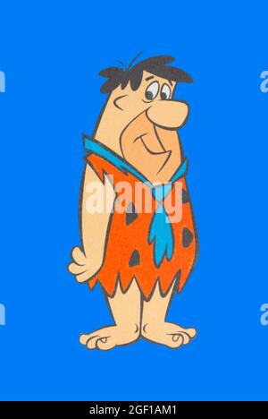 Fred Flintstone character on blue background Stock Photo