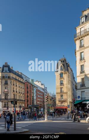 Paris, France - March 1, 2021: Nice haussmannian style building in Paris Stock Photo