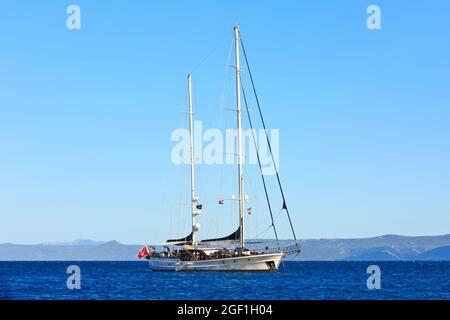 A beautiful two-masted wooden yacht for anchor at Bol (Brac Island), Croatia Stock Photo