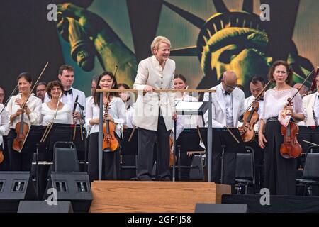 NEW YORK, NY - AUGUST 21: New York Philharmonic perform during 'We Love NYC: The Homecoming Concert' at the Great Lawn in Central Park on August 21, 2021 in New York City. Stock Photo