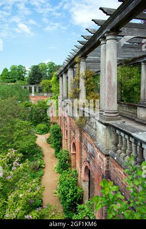 The sun shines over the wooden and brick Hill Garden and Pergola, A Georgian arbour and terrace, Hampstead Heath, London, UK Stock Photo