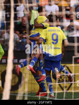 Udine. 23rd Aug, 2021. FC Juventus' Paulo Dybala (top) celebrates his goal with teammates during a Serie A football match between Udinese and FC Juventus in Udine, Italy, Aug 22, 2021 Credit: Xinhua/Alamy Live News Stock Photo