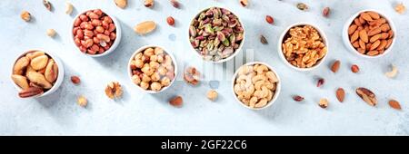 Nut variety panorama with many different types of nuts, shot from the top Stock Photo