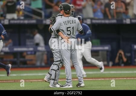 Chicago White Sox catcher Seby Zavala (44) and relief pitcher Vince  Velasquez (23) celebrate the team's 14-2 victory against the Oakland  Athletics in a baseball game in Oakland, Calif., Thursday, Sept. 8