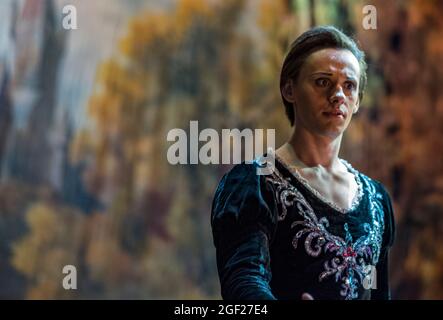 Lead ballet dancer playing the role of Siegfried in a Russian production of Swan Lake at a theater in Saint Petersburg Stock Photo