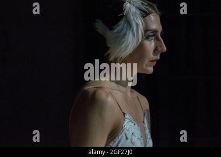 Ballerina waits backstage for the appropriate cue for her entrance in a performance of Swan Lake in Saint Petersburg, Russia Stock Photo