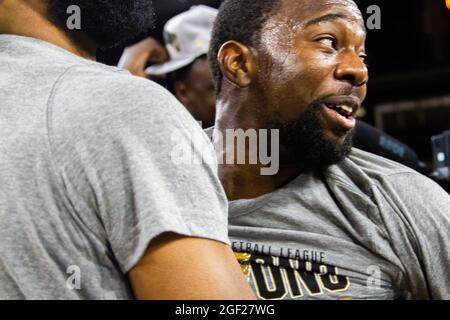 Edmonton, Canada. 22nd Aug, 2021. Jahmal Jones celebrates the Championship Win with their fans after the Canadian Elite Basketball Season Final between the Edmonton Stingers and the Niagara River Lions at the Edmonton Expo Center. The Edmonton Stingers claim their second straight CEBL Championship. Credit: SOPA Images Limited/Alamy Live News Stock Photo
