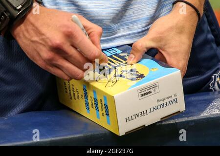 St. Petersburg, FL. USA;  Tampa Bay Rays starting pitcher Tyler Glasnow (20), who had season ending surgery, autographs his bobblehead, which was the Stock Photo