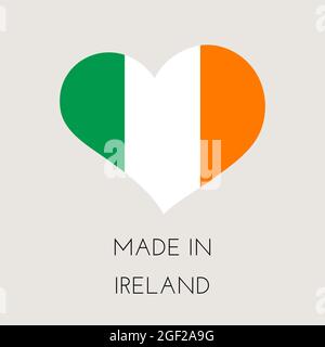 Heart shaped label with Irish flag. Made in Ireland Sticker. Factory, manufacturing and production country concept. Vector stock illustration Stock Vector