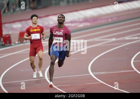 Fred Kerley running the 100 meters at the 2020 Tokyo Olympics. Stock Photo