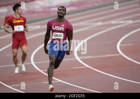 Fred Kerley running the 100 meters at the 2020 Tokyo Olympics. Stock Photo