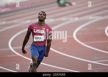 Fred Kerley running the 100 meters at the 2020 Tokyo Olympics. Stock Photo