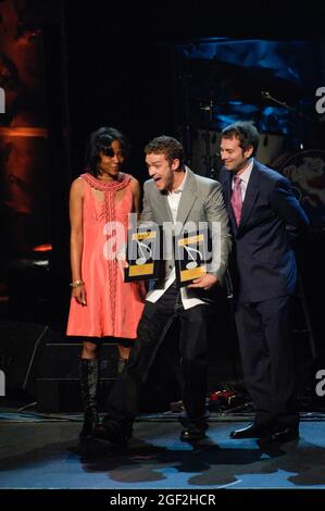 Singer Justin Timberlake (C), Jeanie Weems (L) and Tom DeSavia (R), inside coverage at the 25th Annual ASCAP Pop Music Awards at The Kodak Theatre on April 9, 2008 in Los Angeles, California. Credit: Jared Milgrim/The Photo Access Stock Photo