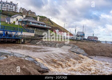 skelton beck in flood at saltburn, north yorkshire, uk Stock Photo