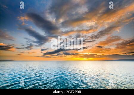 vista from Arbon over Lake Constance with colourful sunrise, Switzerland, Thrugau Stock Photo