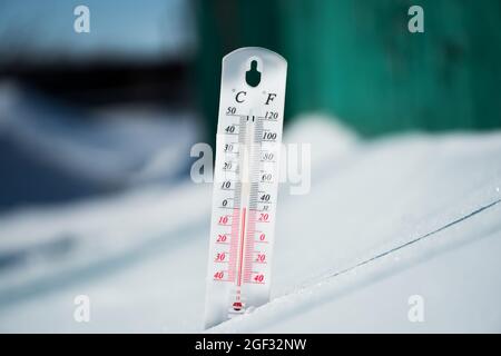 The Thermometer Lies On The Snow In Winter Showing A Negative Temperature  Meteorological Conditions In A Harsh Climate In Winter With Low Air And  Ambient Temperaturesfreeze In Wintertime Stock Photo - Download