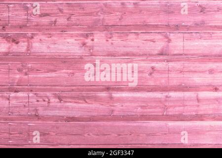 Pink wooden background with old painted planks Stock Photo