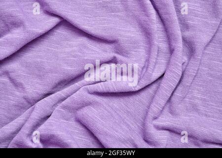 Purple Fabric Texture, Crumpled Cloth Background. Stock Photo