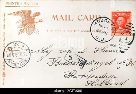Vintage postcard with handwritten address in the Netherlands sent from the USA and postmarked in 1908 in Hoboken (USA) Stock Photo