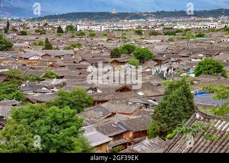 The traditional roofs of the old town of Lijiang, China. Dayan, commonly called the Old Town of Lijiang is the historical center of Lijiang City Stock Photo