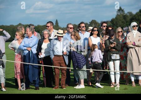 Egham, Surrey, UK. 22nd August, 2021. Guests watching the prize giving at Guards Polo Club. Credit: Maureen McLean/Alamy Stock Photo