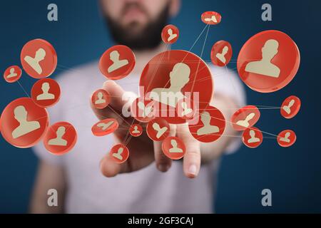 Male's hand touching floating 3D networking signs Stock Photo