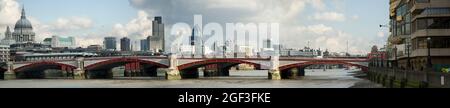 Archve panoramic image of City of London skyline seen over Blackfriars Bridge in 2004. Stock Photo