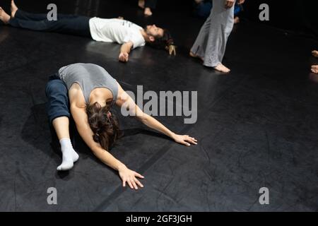 solo dancer move in contemporary improvisation performance Stock Photo