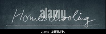 Homeschooling, handwritten with chalk on a blackboard, sign, lockdown schools Stock Photo
