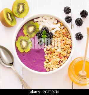 Smoothie bowl - blackberries, blueberries and banana. An idea for a nutritious and healthy breakfast meal. Stock Photo