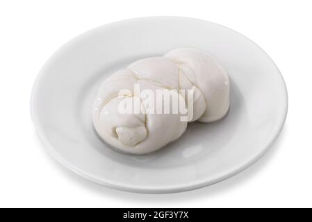braid of italian mozzarella cheese made with buffalo milk in white plate isolated on white background Stock Photo