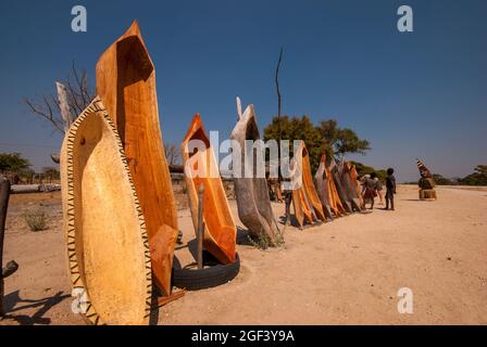 African souvenirs for tourists, mini mokoro boats on sale on the Caprivi Strip, on the Angola border, Namibia Stock Photo