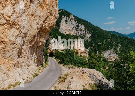 Picturesque landscape with mountain road. Old road with tight serpentines on the mountains Stock Photo