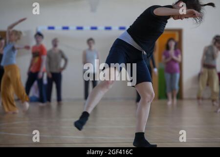 solo dancer move in contemporary improvisation performance Stock Photo