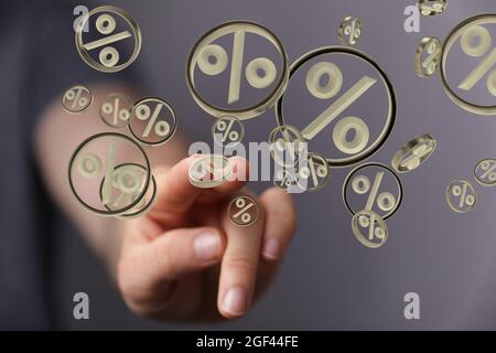 Hand touching floating 3D rate icons Stock Photo