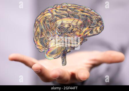 A floating 3D human brain icon above a hand - artificial intelligence ...