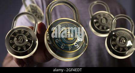 Man touching the virtual 3D padlock icons symbolizing data security Stock Photo