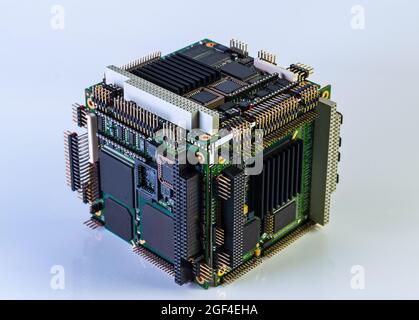 cube from PC/104 form factor electronics boards on white background with reflection Stock Photo