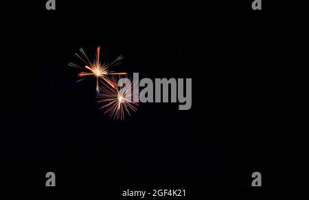 A Fireworks Display on a Beautiful Night Full of Color and Multiple Explosions Stock Photo