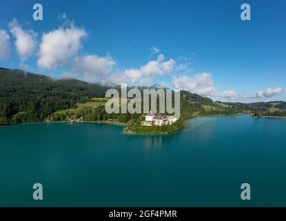 Austria, Salzburg, Hof bei Salzburg, Drone view of Lake Fuschl in summer with Schloss Fuschl in background Stock Photo