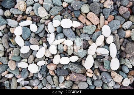 Background from sea pebble. Small stones, top view Stock Photo - Alamy