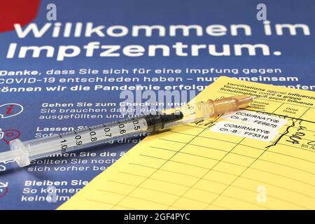 Documentation of the first and second vaccination with BioNTech/Pfizer COVID-19 vaccine Comirnaty given in a German vaccination center. Stock Photo