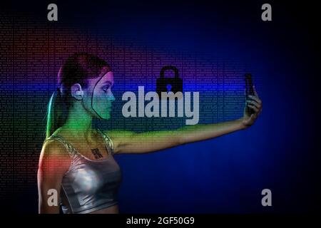 Young woman using phone with lock icon over blue background Stock Photo