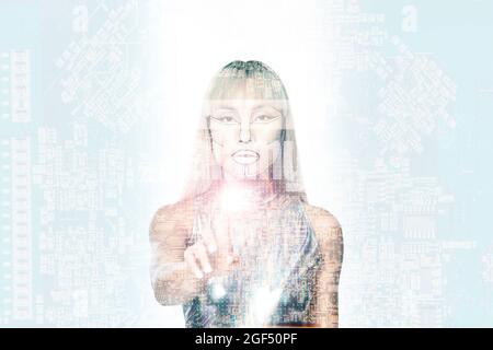 Robotic woman with silver bodysuit using graphical interface over circuit board Stock Photo