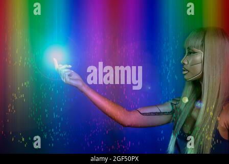Robotic woman with glowing finger against multi-colored background Stock Photo